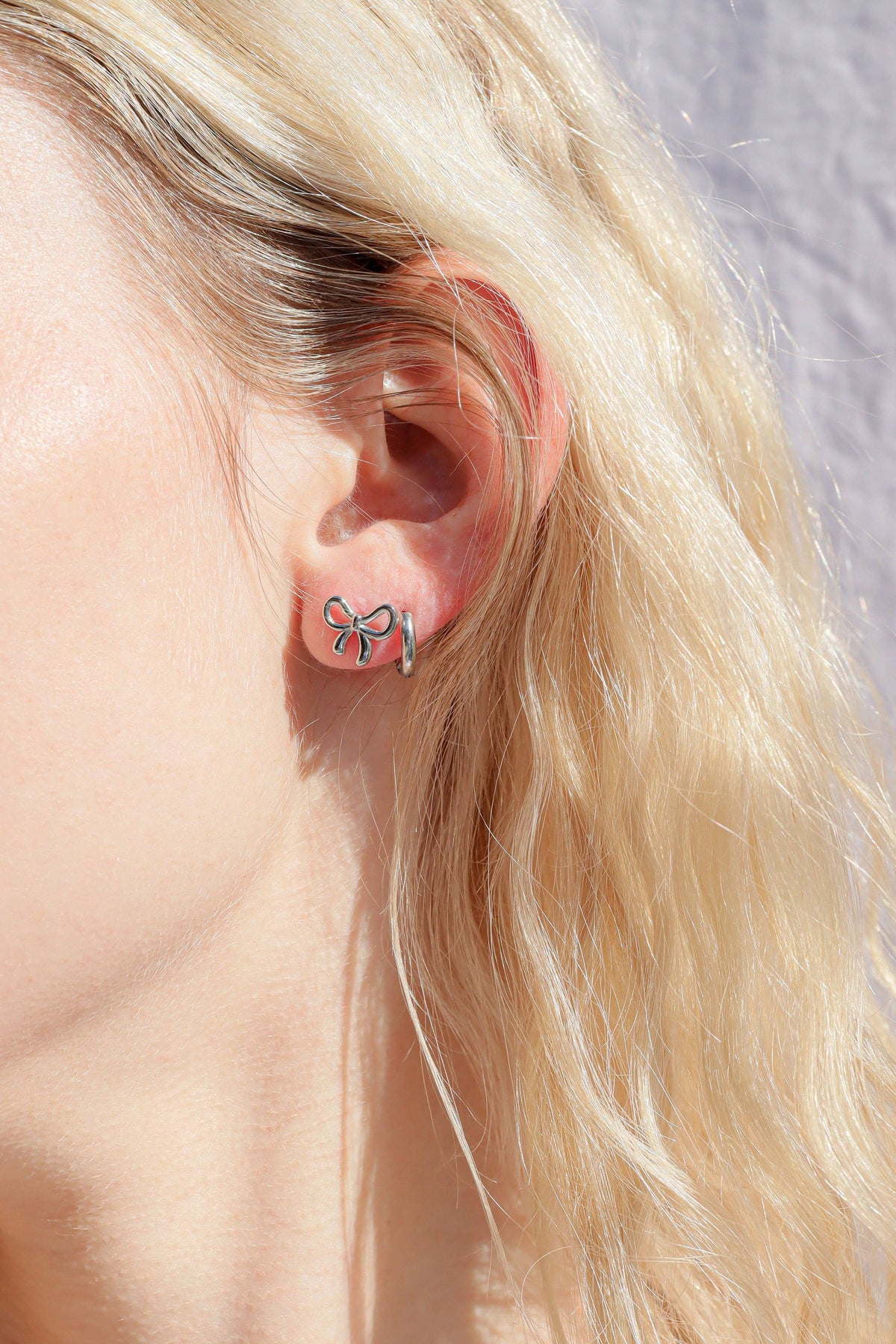 Bow Stud Earrings: 18K Gold PVD Stainless Steel