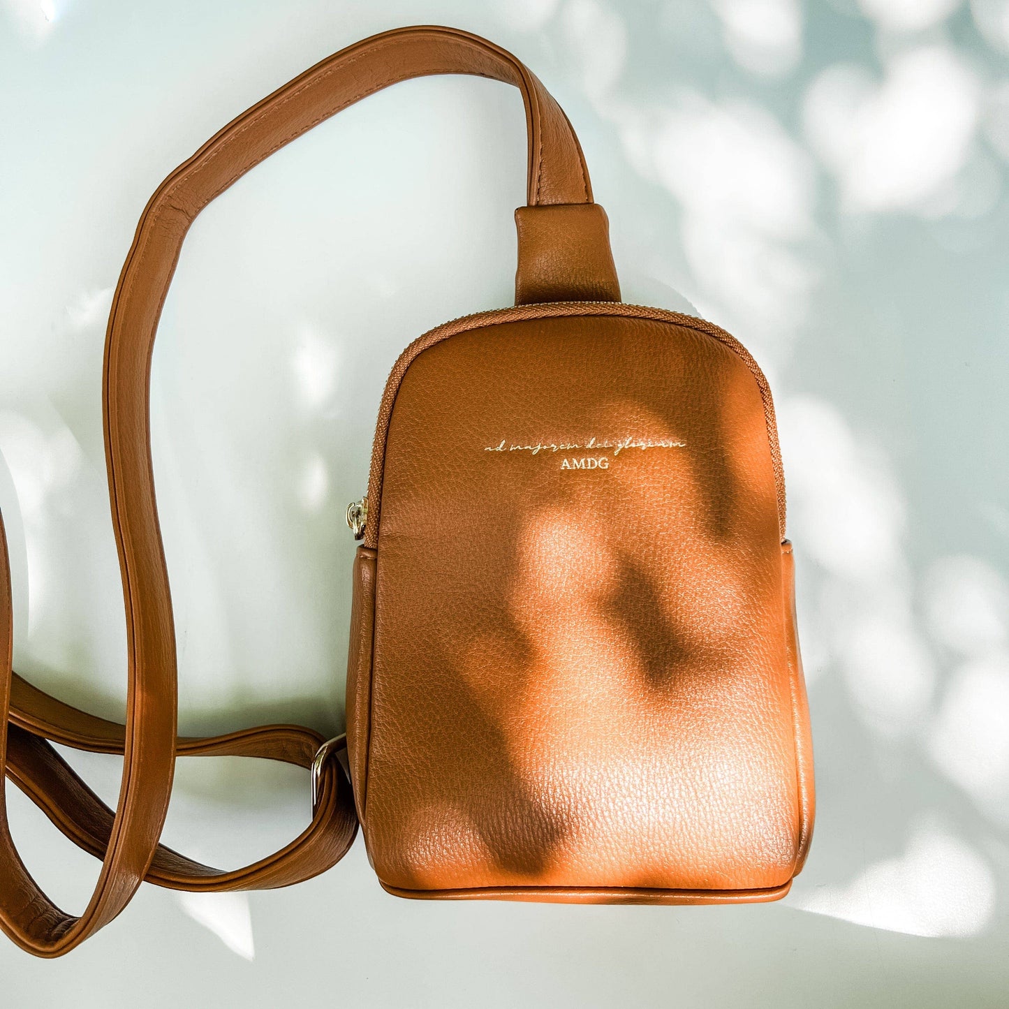 “For the Greater Glory of God” Crossbody Bag — Camel