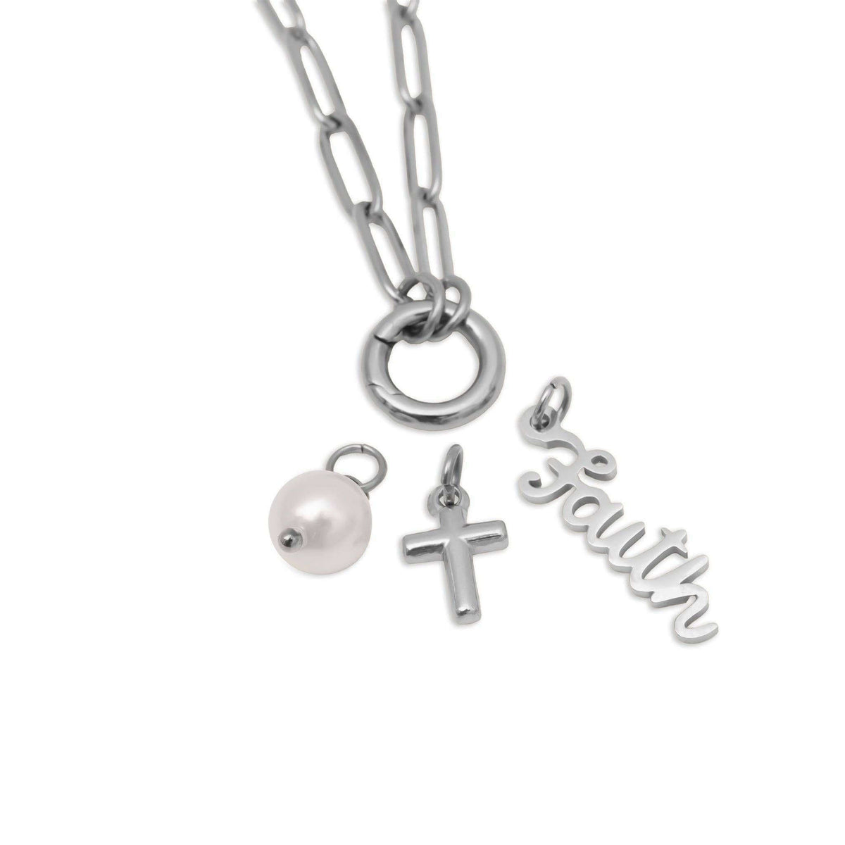 DIY faith necklace gift featuring silver chain, faith charms, and a pearl detail.