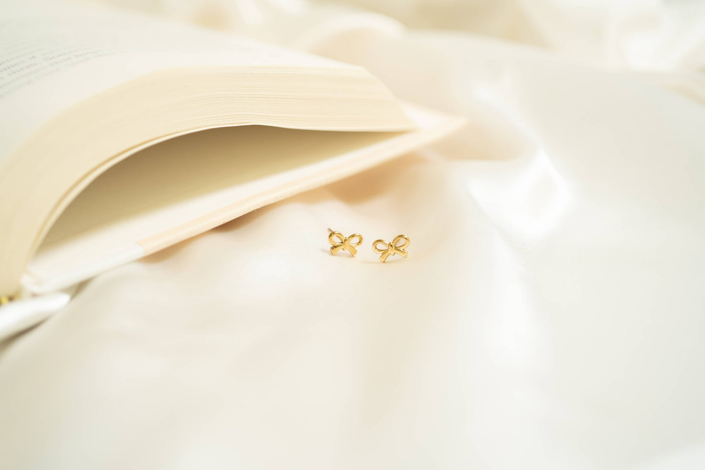 Bow Stud Earrings: 18K Gold PVD Stainless Steel